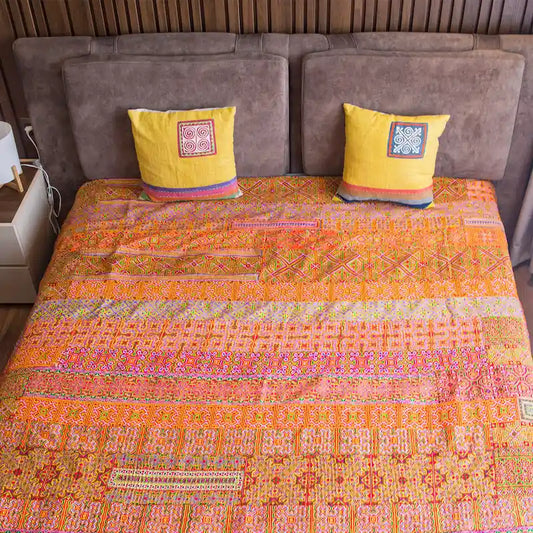 Vindigo orange cotton bed cover with traditional Hmong batik front view