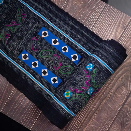 Vindigo black Hmong fabric with diamond panel embroidery, flat layout