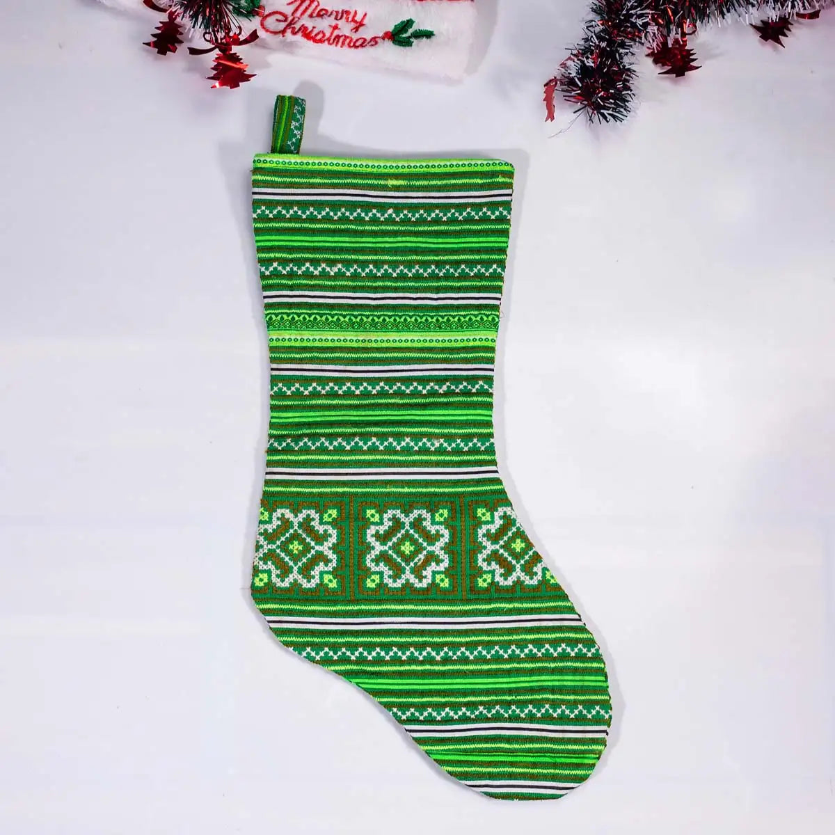 Vindigo green hand-embroidered H’mong Christmas stocking close-up