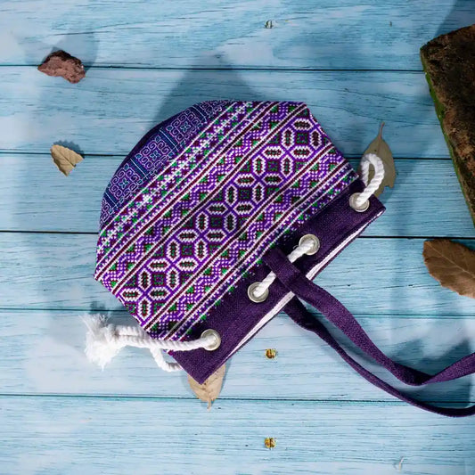 Vindigo purple embroidered canvas bucket bag side flat view