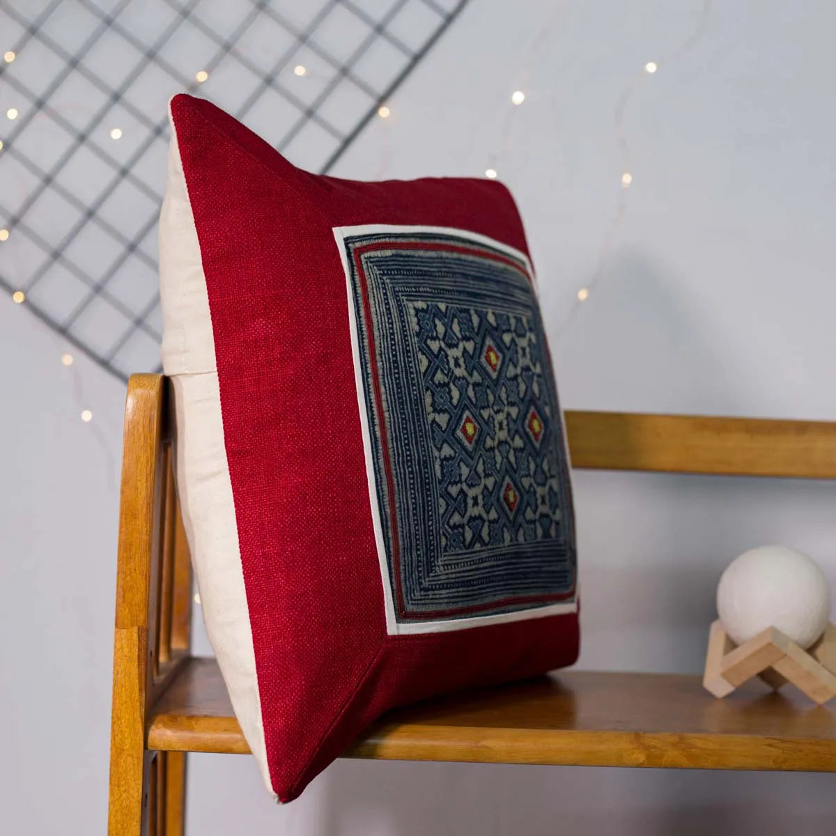 Vindigo red cushion cover side angle showing contrast between red and white fabric