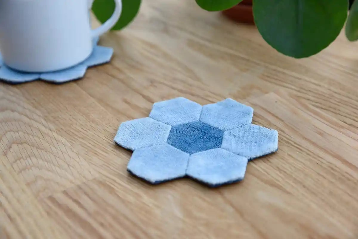 Side view showing layered denim texture of hexagon flower coaster