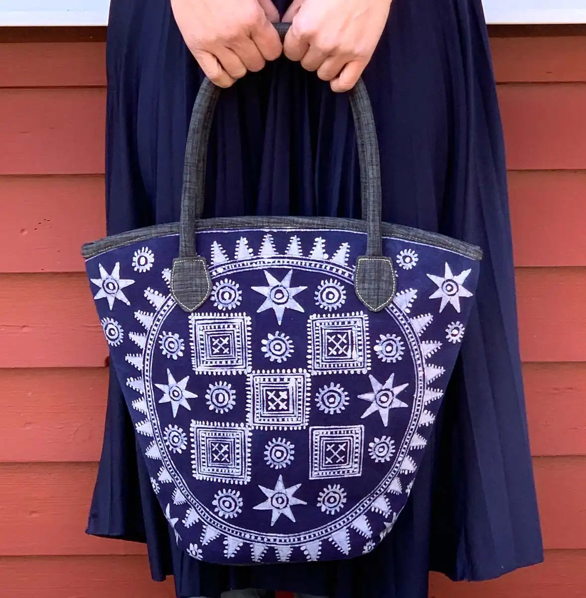 Vindigo batik tote carried by model outdoors