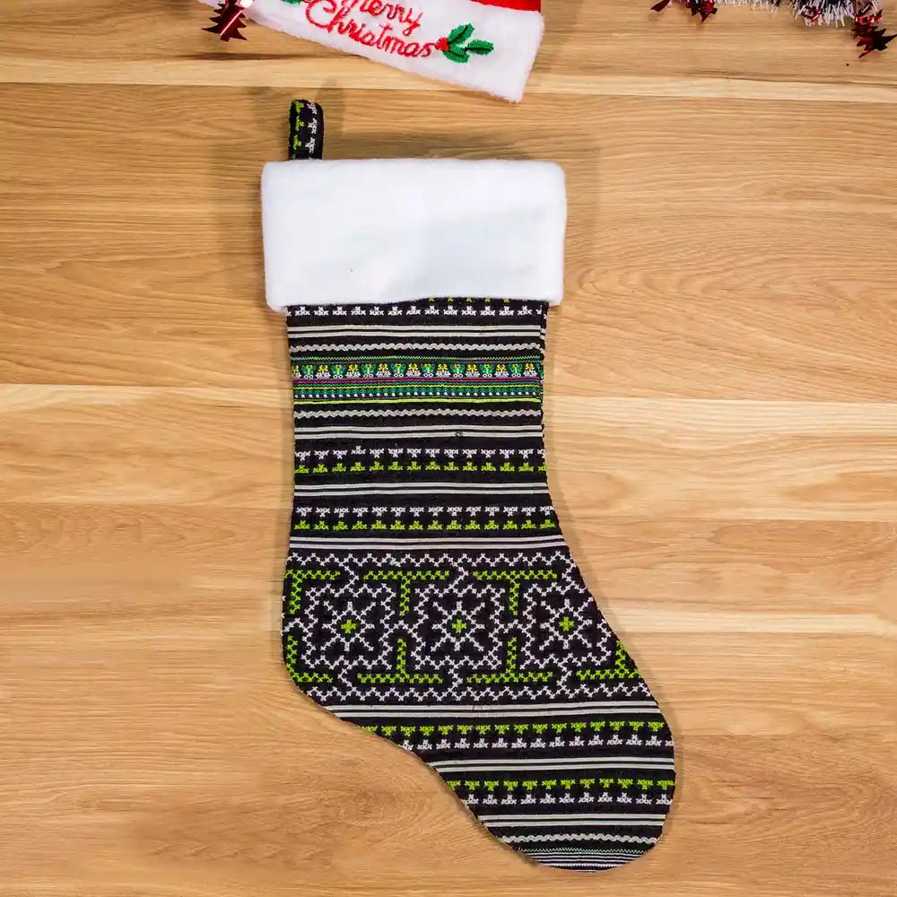Vindigo green tribal pattern Christmas stocking with white top front view