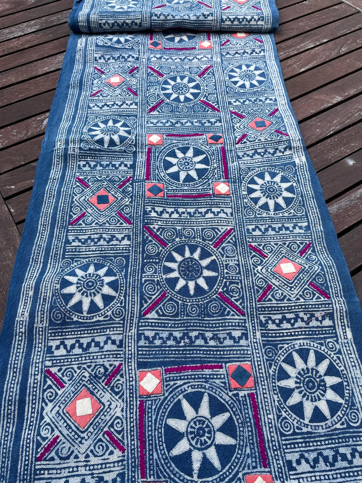 Block print batik with embroidery and appliqué on cotton in Sun pattern