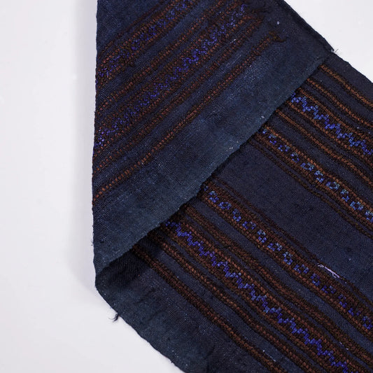 Vintage cross-stitch embroidery roll with shining brown and deep purple thread
