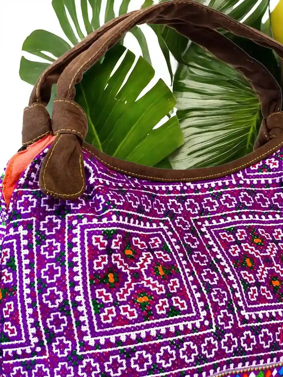 Vindigo handbag purple brown angled side view