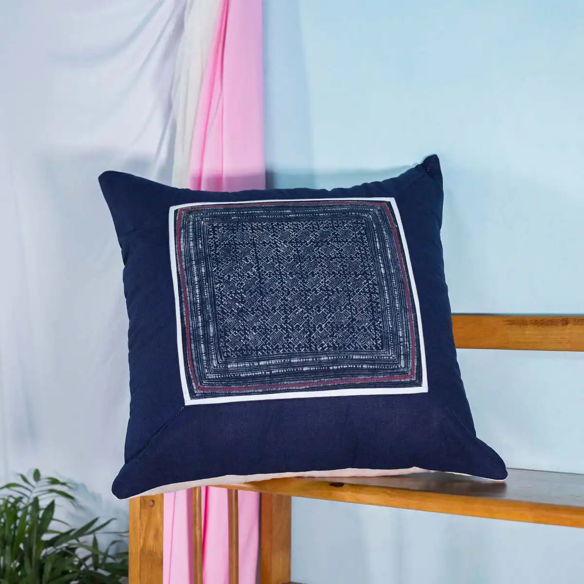 Vindigo cushion cover navy embroidered square on chair