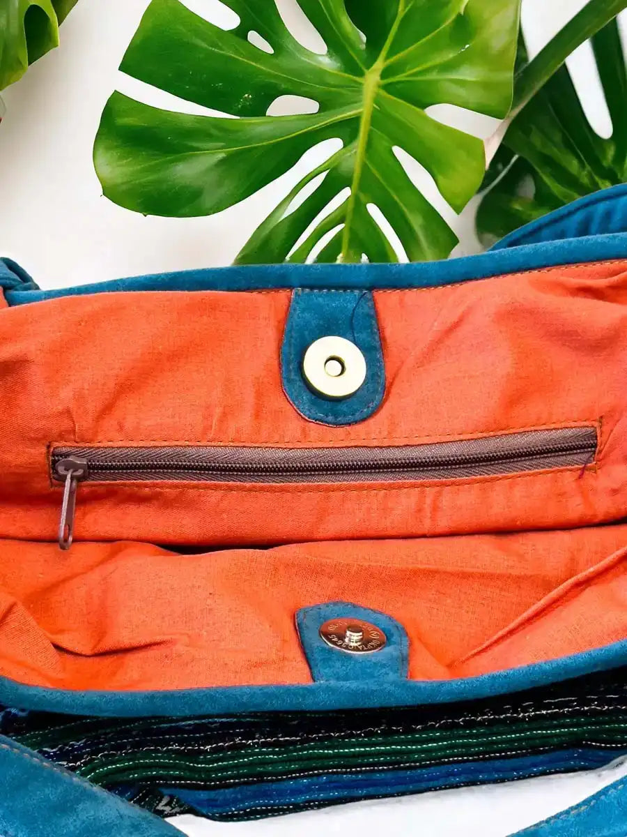 Vindigo handbag blue embroidered with orange lining inside detail view