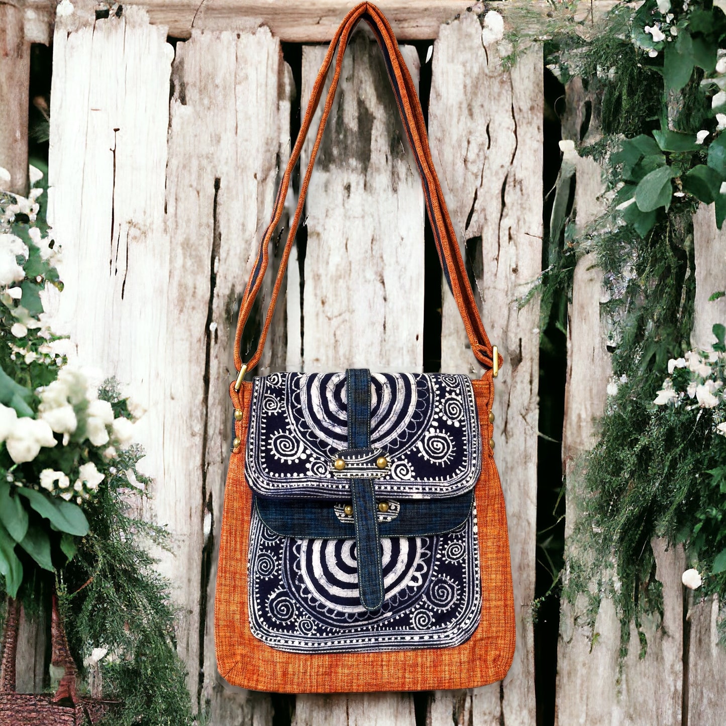 Batik cross-body bag, hand-drawn batik pattern, saffron spice orange, sun pattern