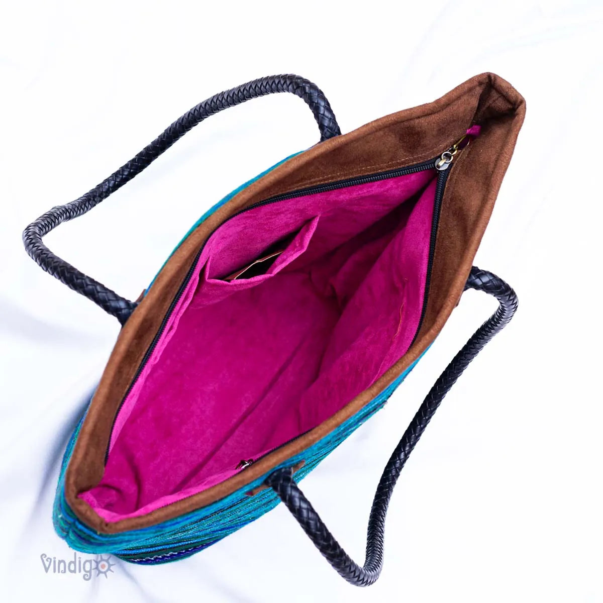 Open-top view of Vindigo blue tribal tote with pink interior