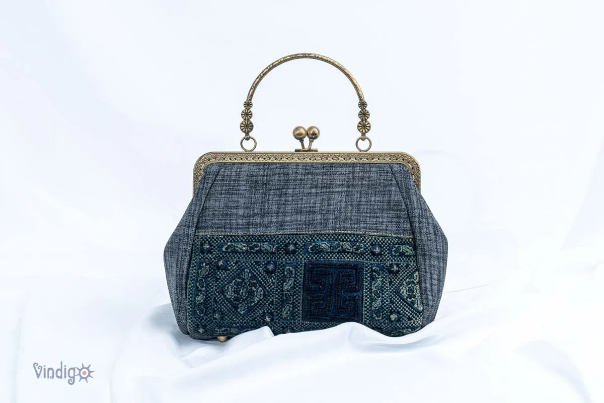 Vindigo black hemp handbag with vintage embroidery and copper frame front view