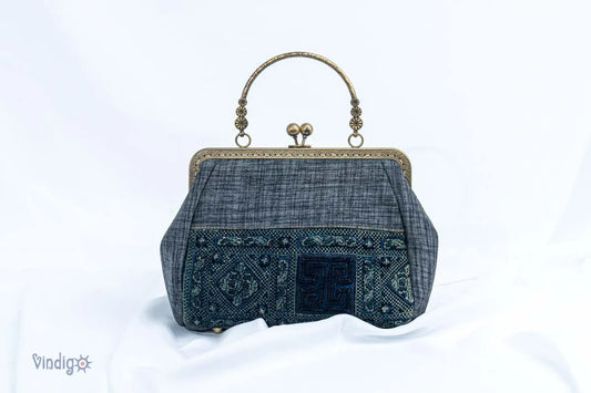 Vindigo black hemp handbag with vintage embroidery and copper frame front view