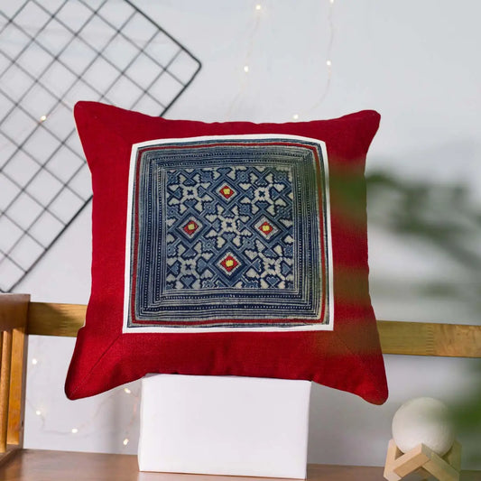 Vindigo red canvas cushion cover front view with indigo H’mong batik embroidery patch