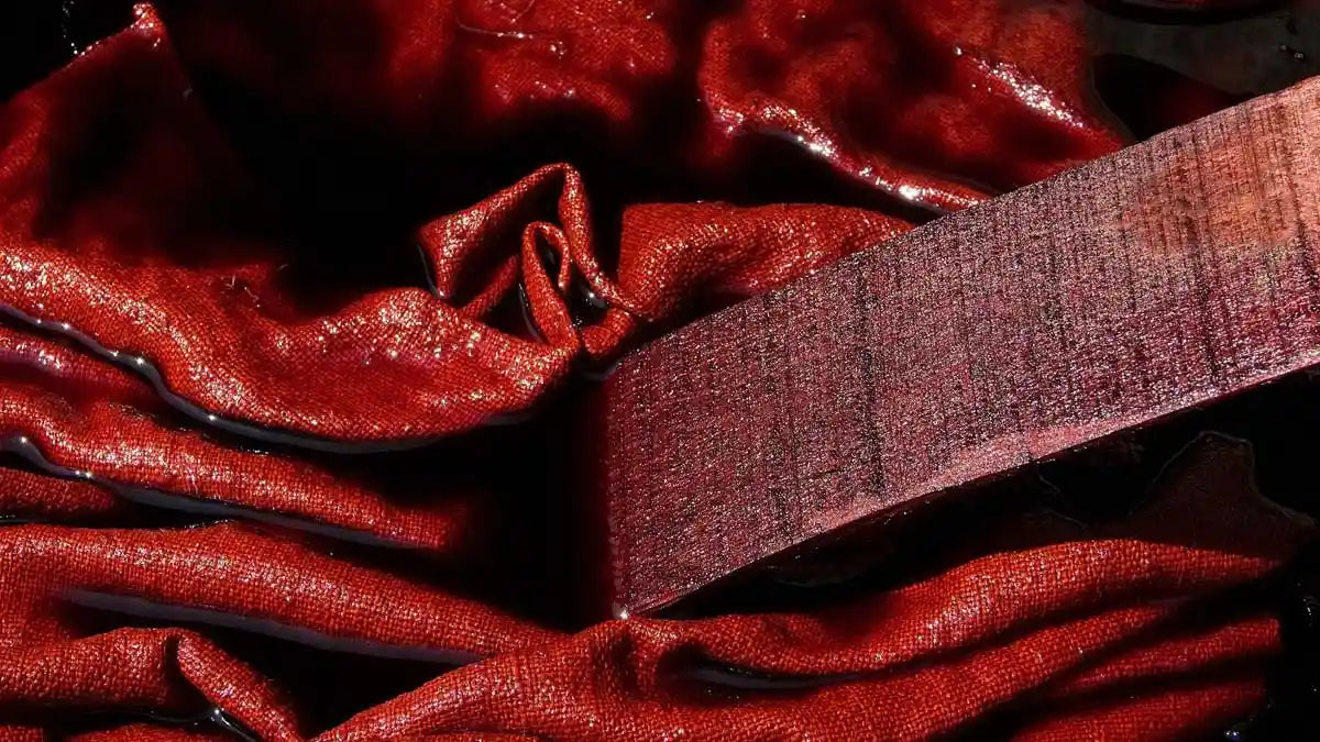 Vindigo red hemp fabric close-up showing fine weave texture