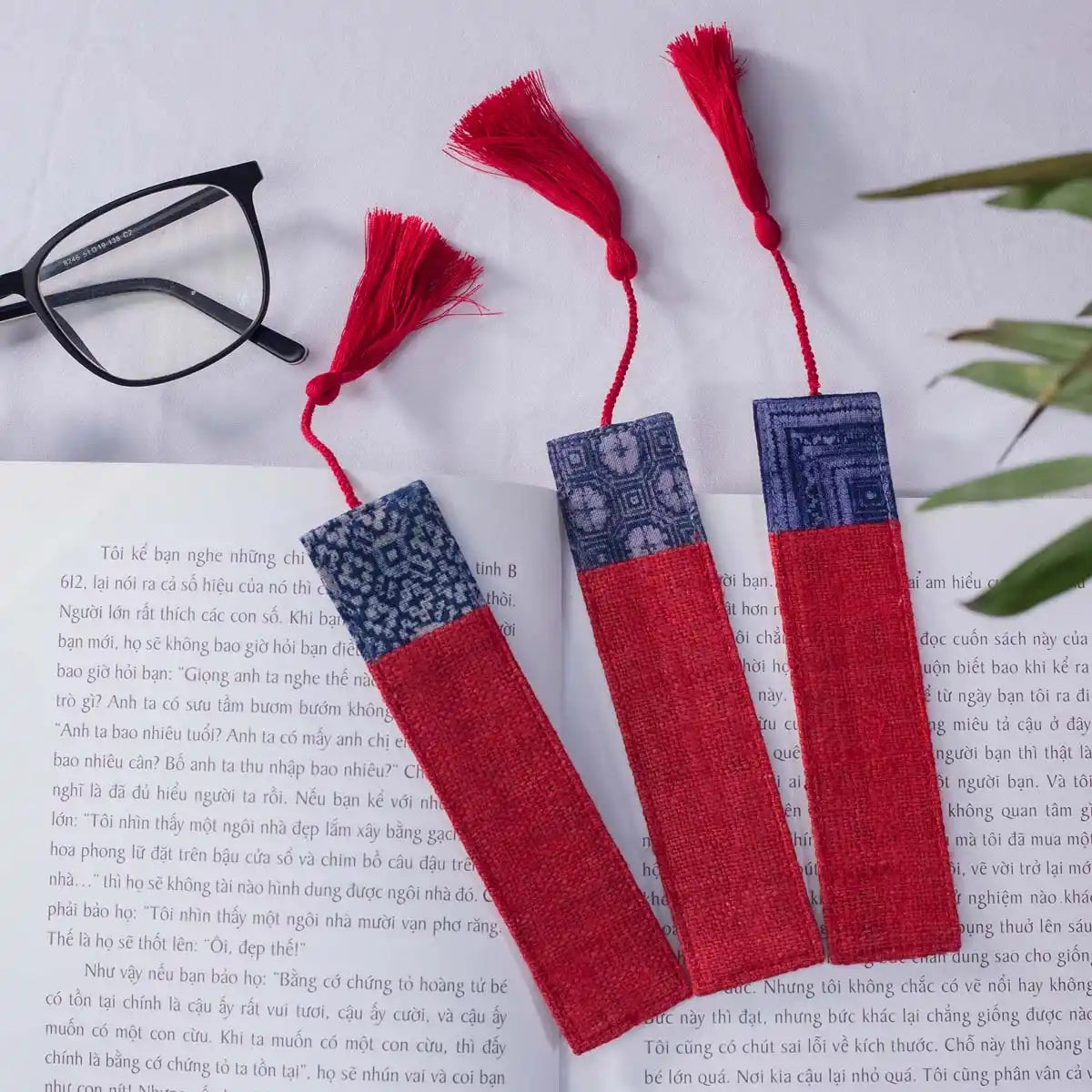 Vindigo red hemp batik pattern bookmarks on open book