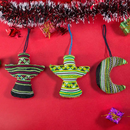 Vindigo green tribal embroidered ornaments hanging on red background