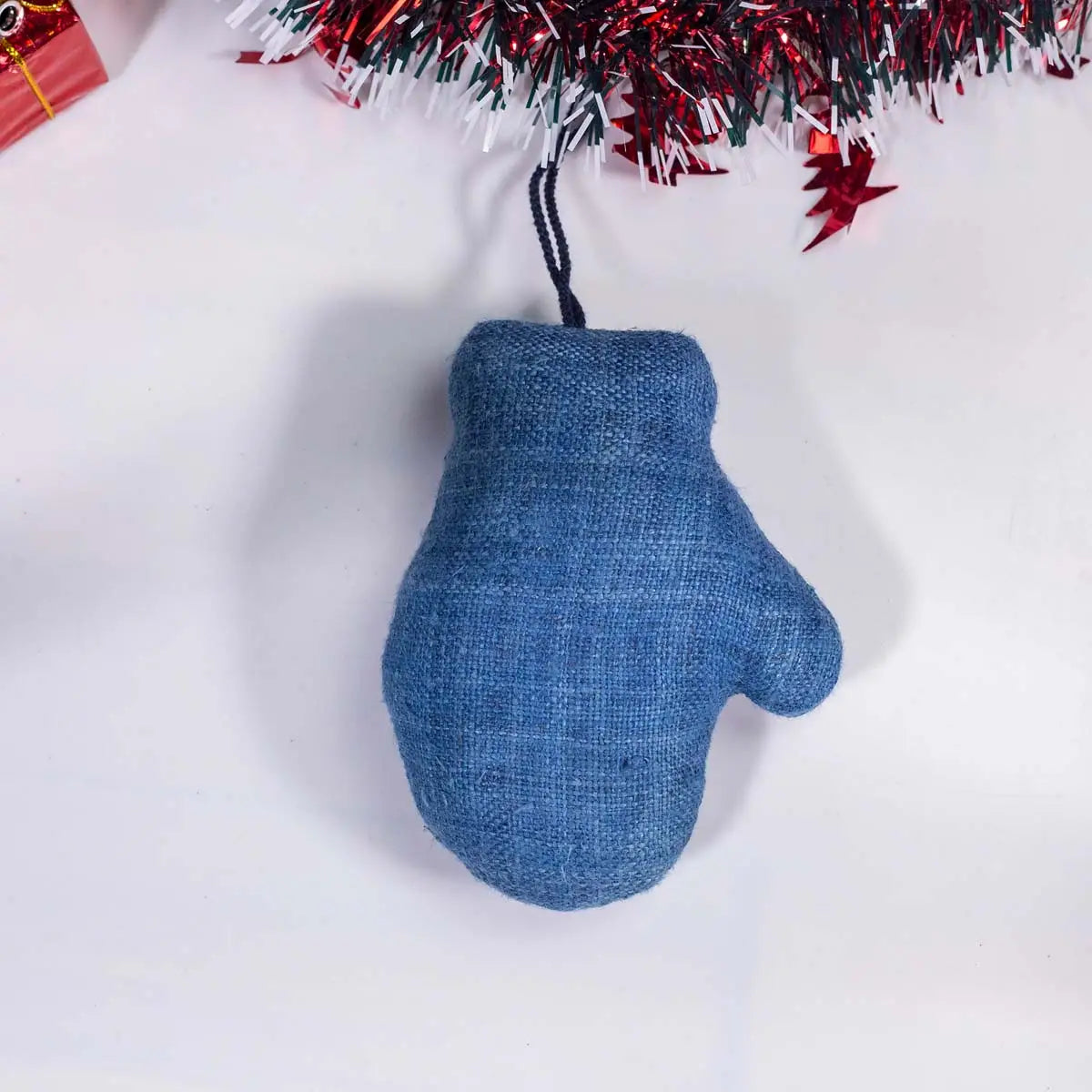 Vindigo blue tribal embroidered mitten-shaped Christmas ornament front view
