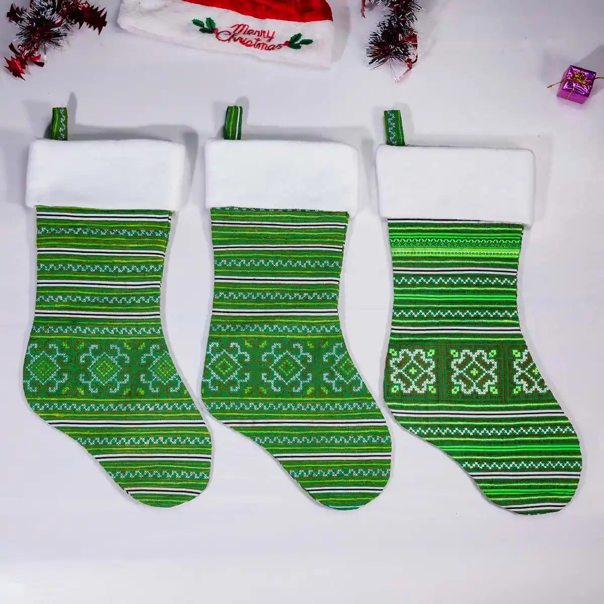 Vindigo green embroidered Christmas stockings with white cuff front view