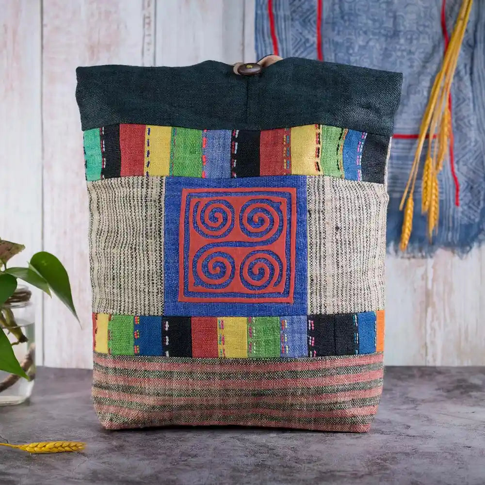 Vindigo shoulder bag teal hemp with blue spiral patch front view