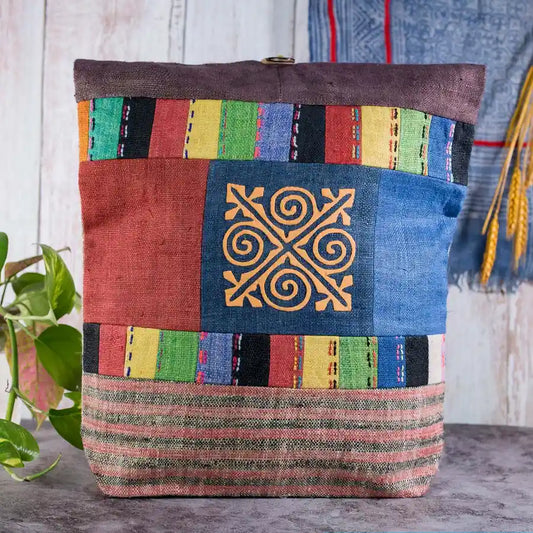 Vindigo shoulder bag brown hemp with gold spiral patch front view