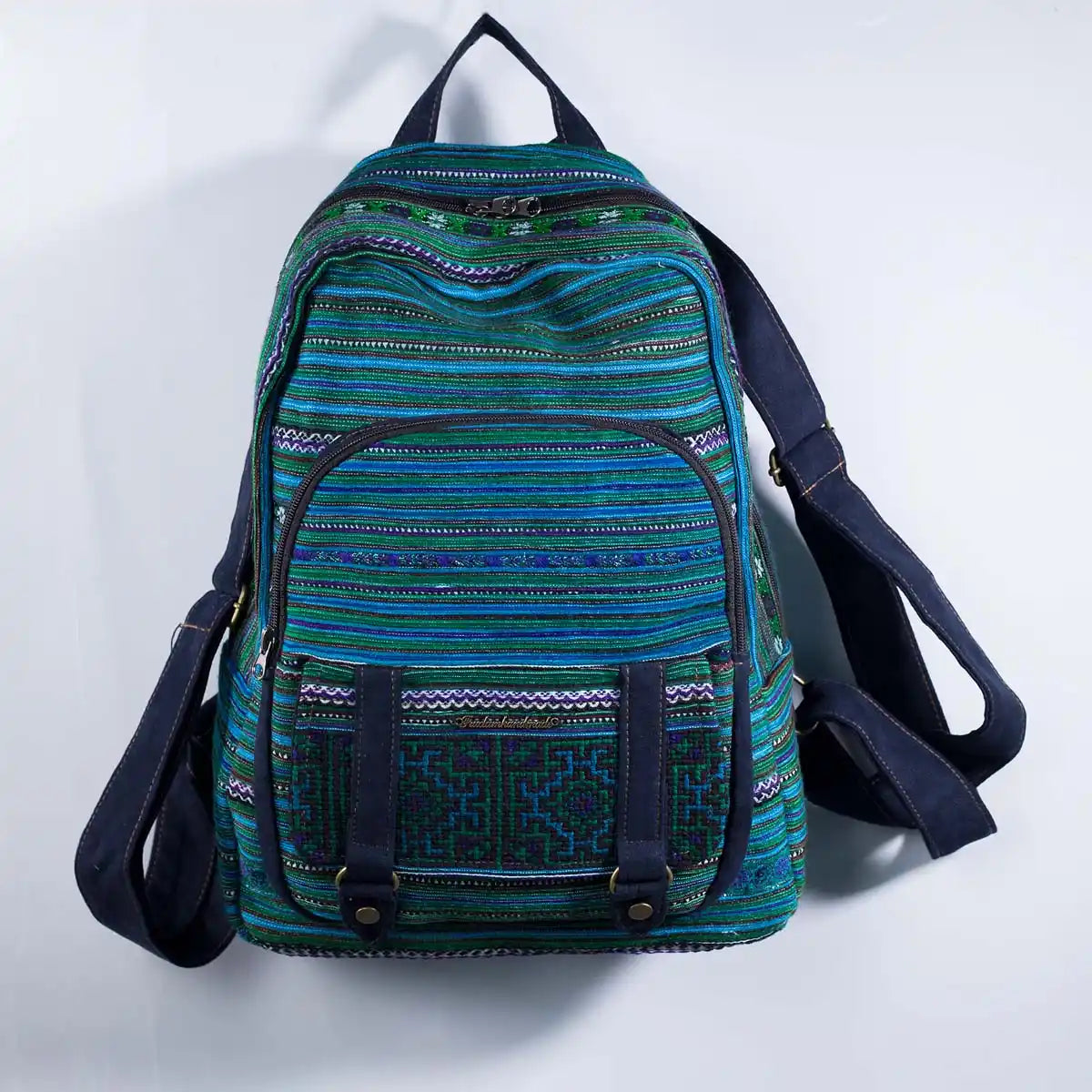 Vindigo green embroidered cotton backpack with Hmong pattern front view