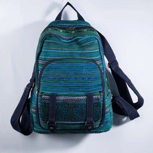 Vindigo green embroidered cotton backpack with Hmong pattern front view