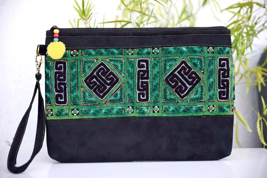 Front view of Vindigo green and black hemp clutch with tribal embroidery