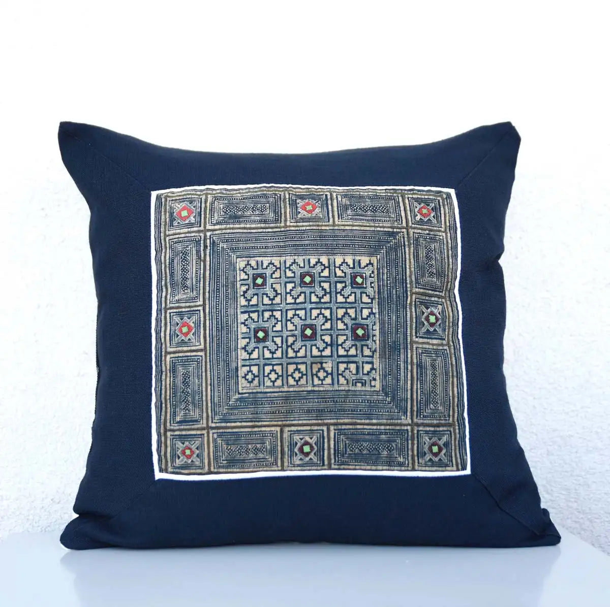 Front view of Vindigo indigo hemp cushion cover with tribal embroidery