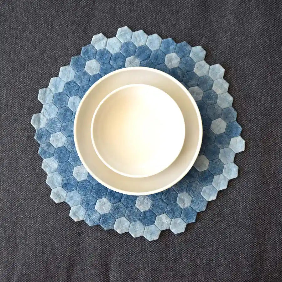 Vindigo denim blue hexagon placemat with ceramic bowl