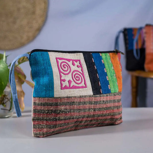 Vindigo hemp cosmetic bag blue and pink front view with spiral embroidery