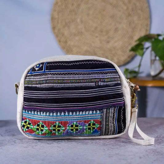Vindigo beige and blue hemp cosmetic bag front view with tribal embroidery