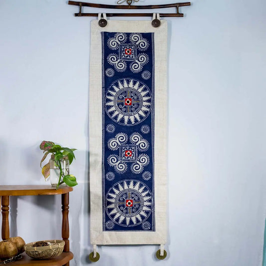 Vindigo indigo hemp batik tapestry hanging beside a plant