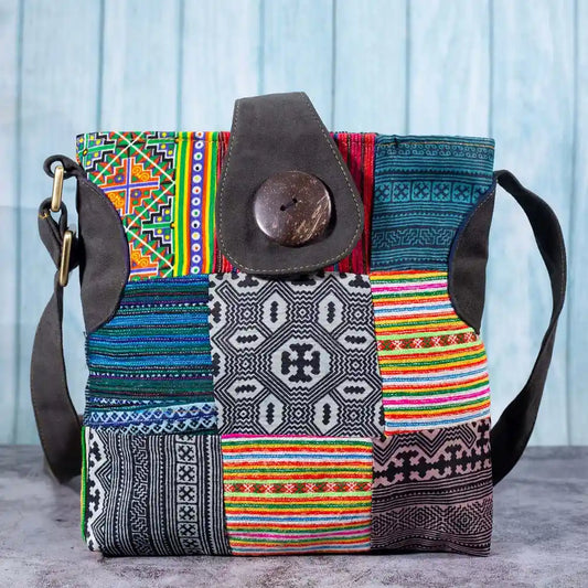 Vindigo multicolor crossbody bag front view with H’mong patchwork and coconut button