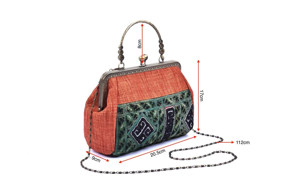 Vindigo blue and green embroidered handbag with copper handle and size guide
