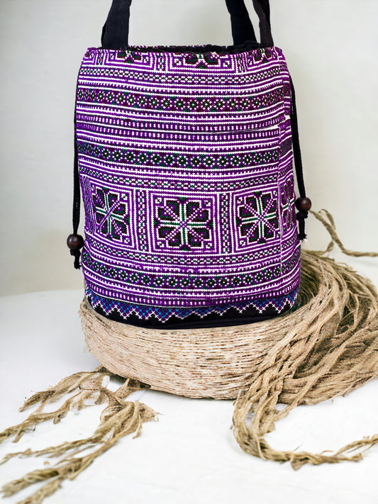 Purple embroidery shoulder bag with string to close
