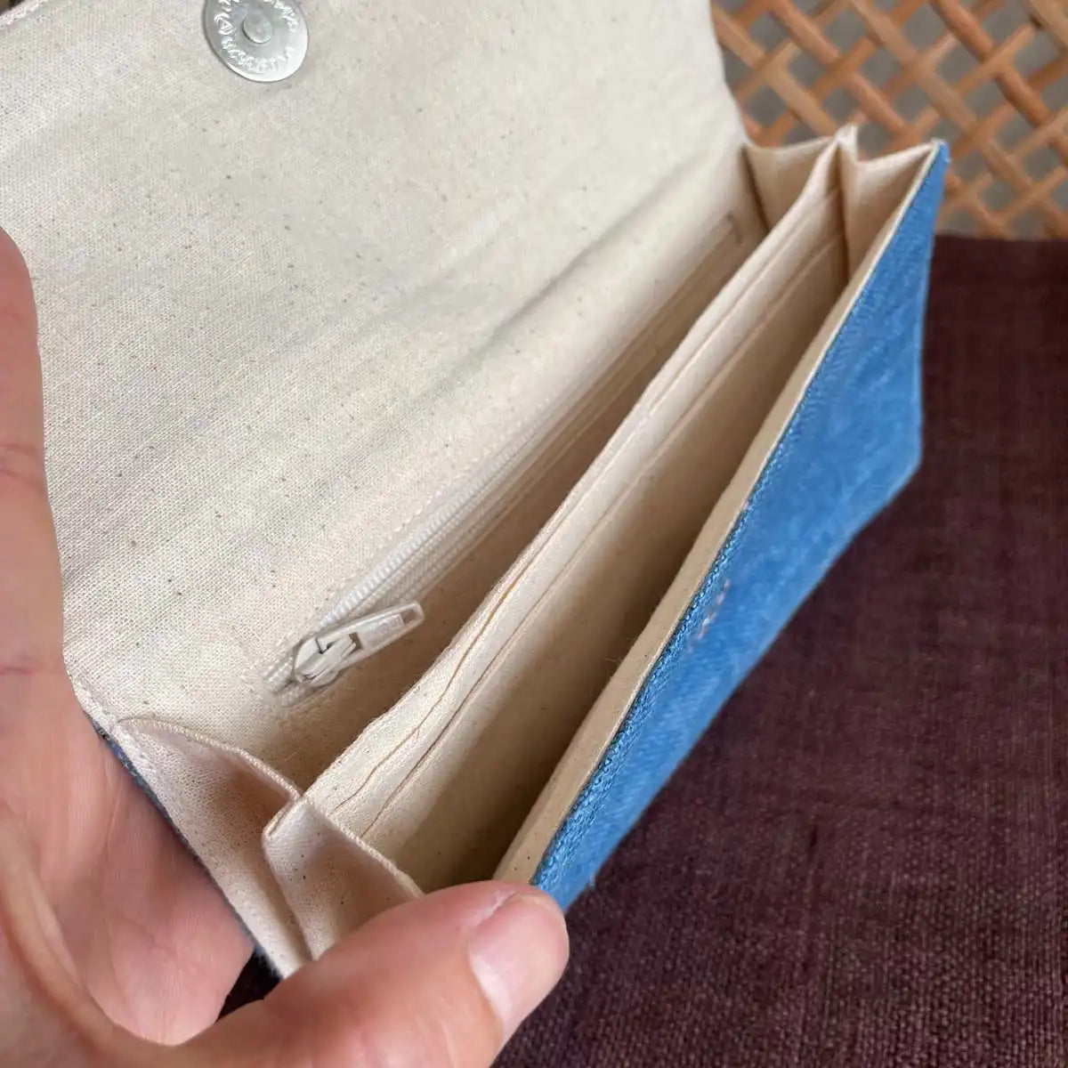 Vindigo long purse denim blue hemp heart pattern inside view with hand