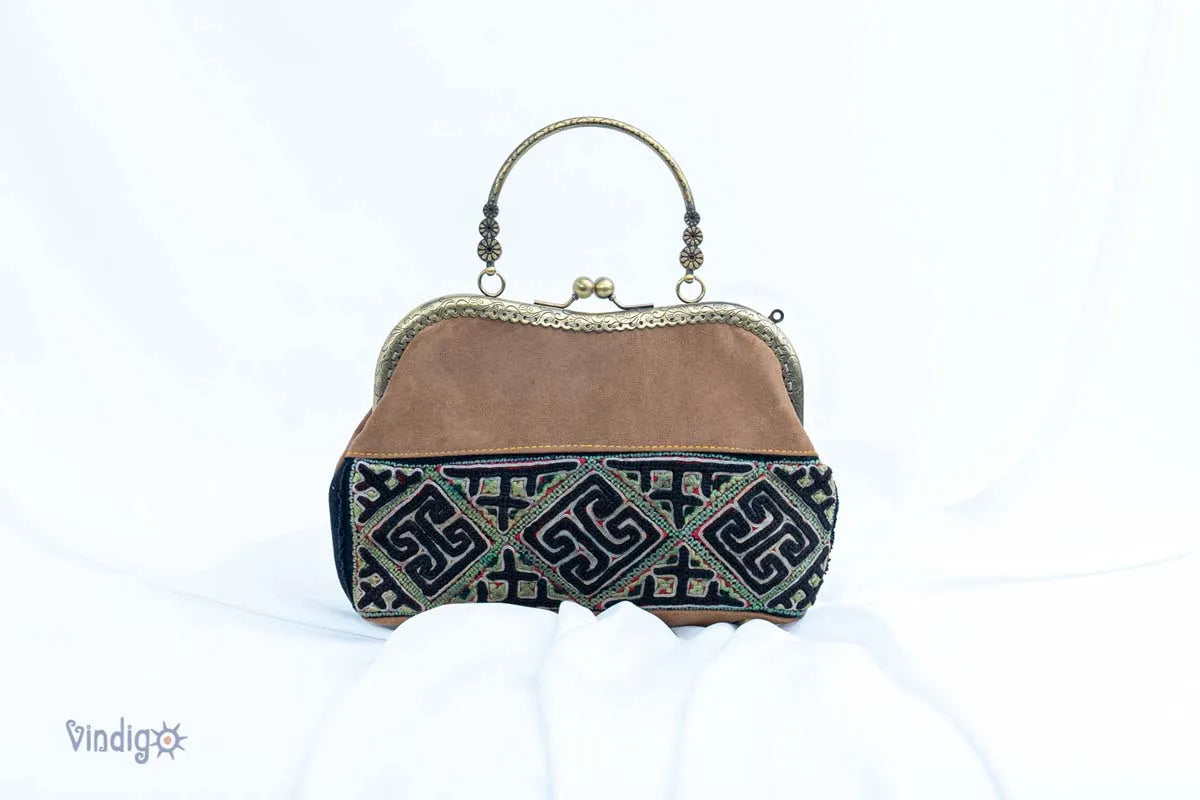Brown and black handbag with tribal embroidery front view