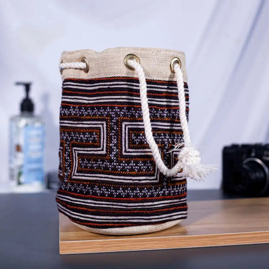 Vindigo brown embroidered canvas bucket bag side view