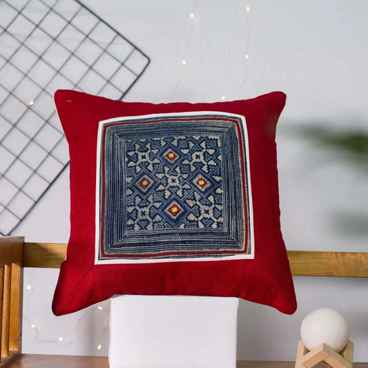 Vindigo red cushion cover front view showing handmade H’mong batik pattern