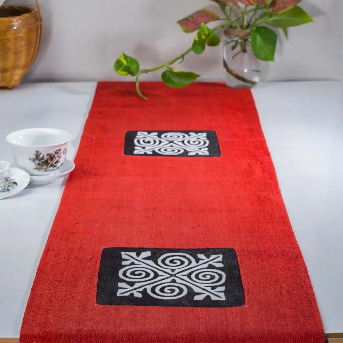 Vindigo red hemp table runner full top view with central white cotton embroidery