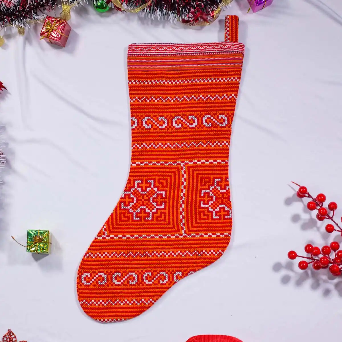 Vindigo red hand-embroidered Christmas stocking front angle