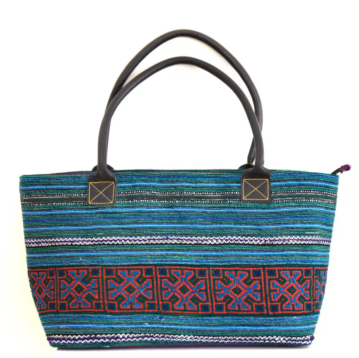 Front view of blue purple hemp tribal tote with brown handles