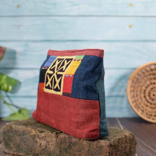 Vindigo red-blue hemp cosmetic bag side view showing embroidered patch