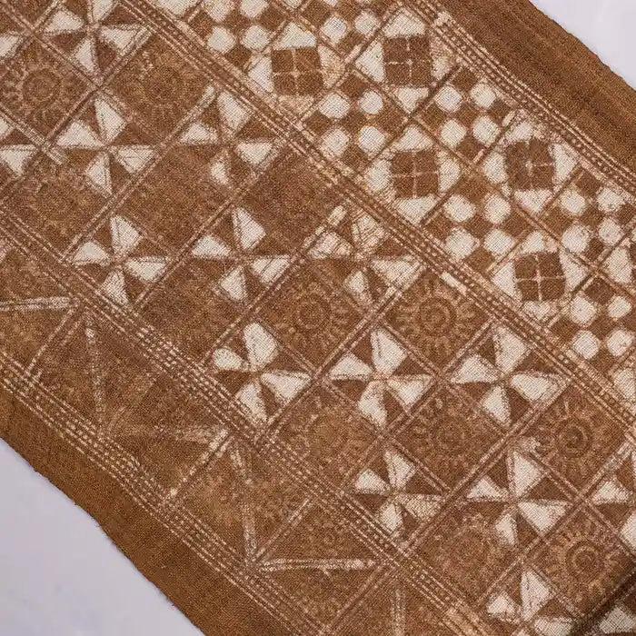 Vindigo brown ethnic geometric fabric roll top-down view