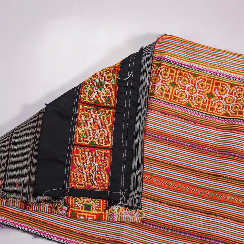 Vindigo handmade orange cotton tribal embroidered fabric roll side angle