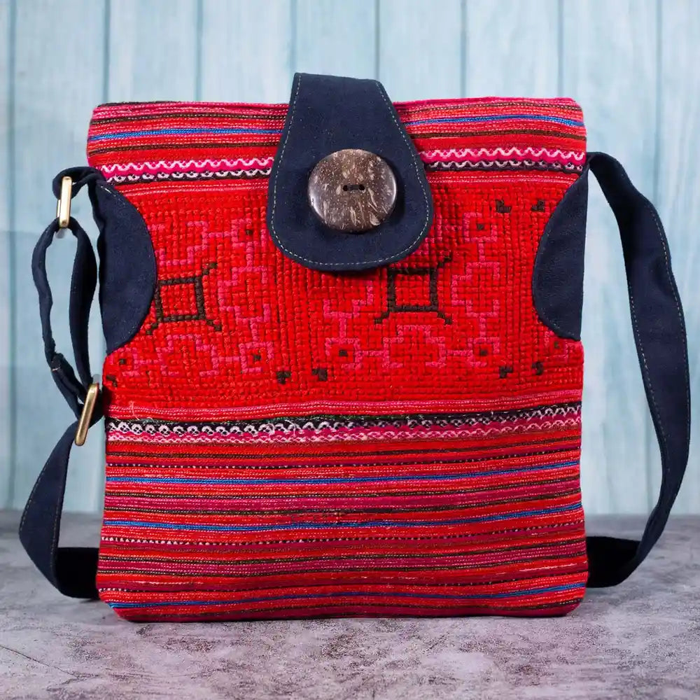 Vindigo red hemp crossbody bag front view with H’mong embroidery and coconut button