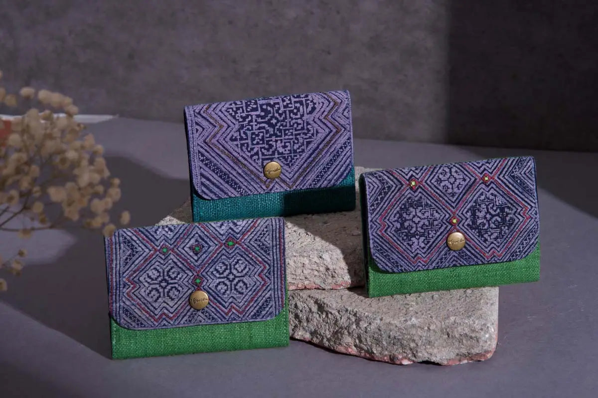 Vindigo collection of green batik cardholders with tribal patterns on display