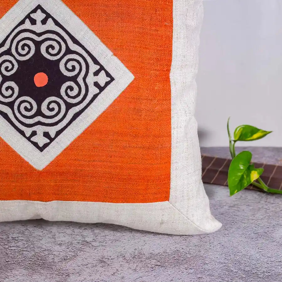 Vindigo handmade hemp cushion cover with orange front and tribal patch