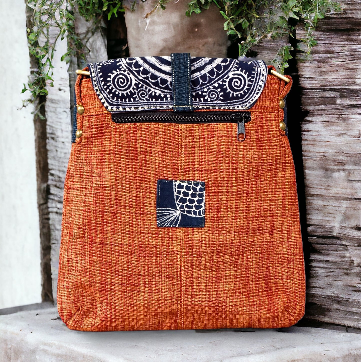 Batik cross-body bag, hand-drawn batik pattern, saffron spice orange, sun pattern